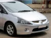 Dịch vụ thay kính chắn gió xe Mitsubishi Grandis tận nơi